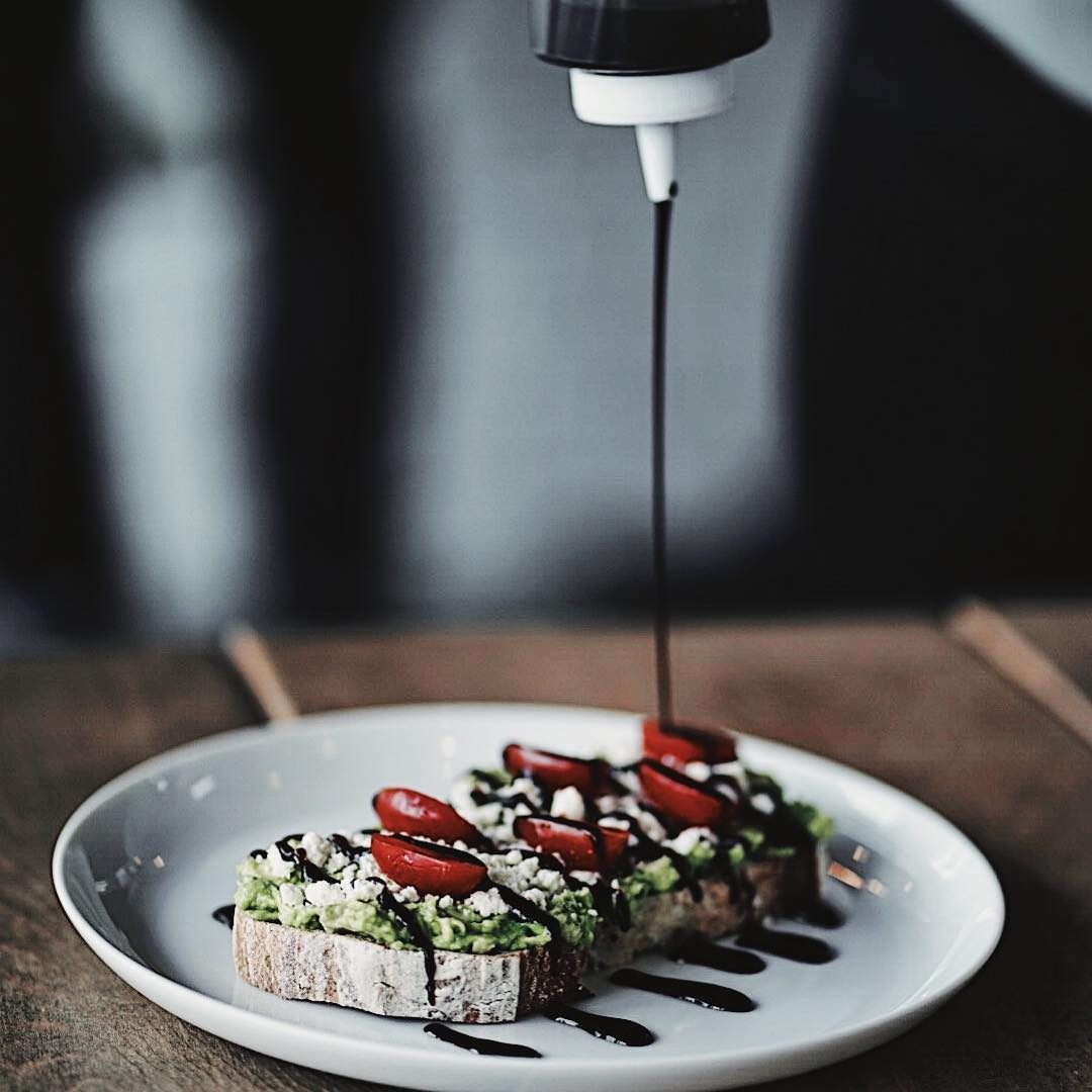 Bruschetta with balsamic drizzle being plated